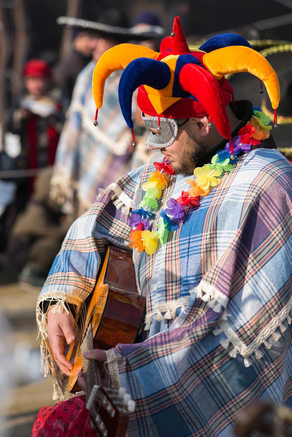 A masked man at Surva